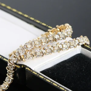 Złota bransoletka z diamentami 0.75ct tenisówka 17cm 9K