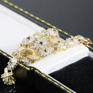 Złota bransoletka z szafirami i diamentami 0.30ct 18,5cm 9K