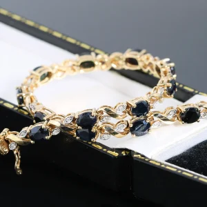 Złota bransoletka z szafirami i diamentami 18cm 9K