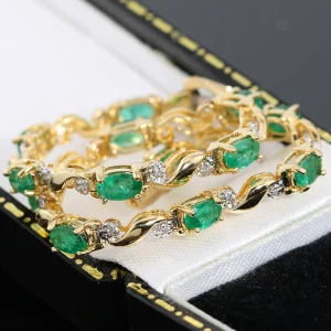 Złota bransoletka ze szmaragdami i diamentami 18,5cm 14K